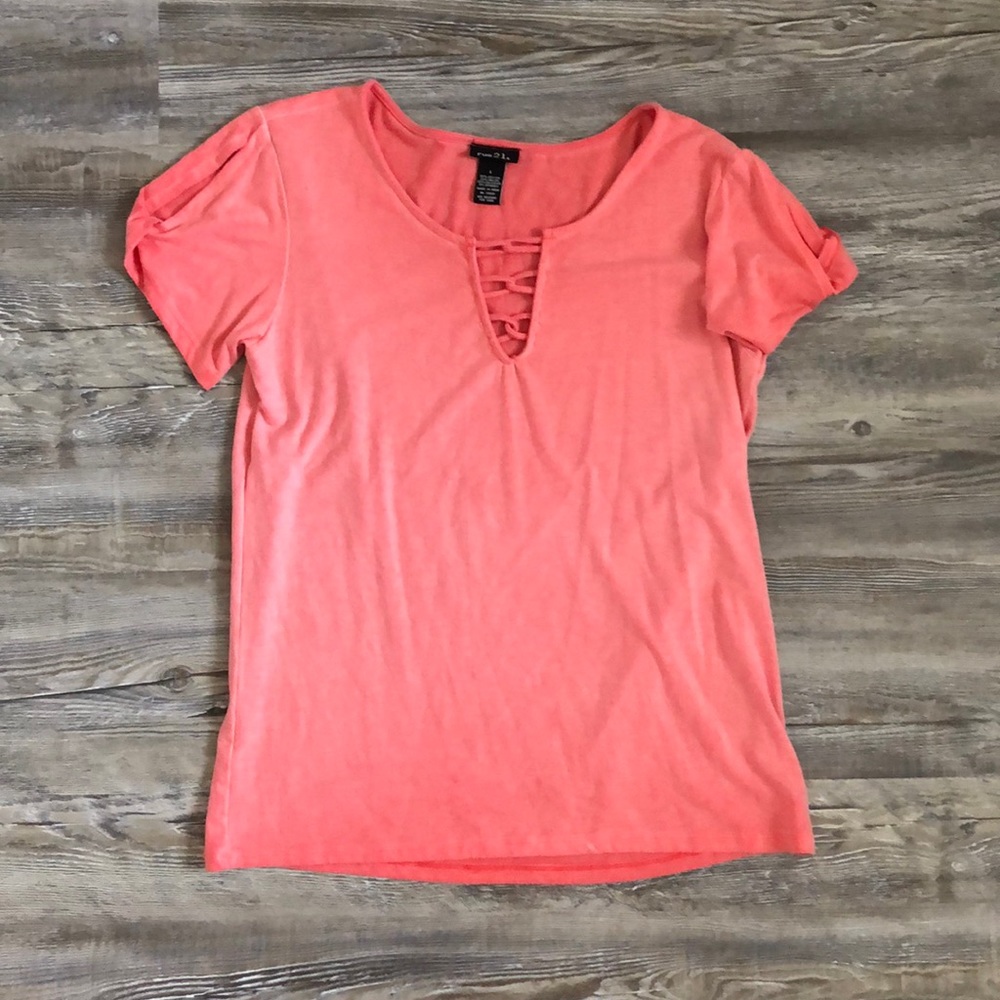Soft pink shirt with details